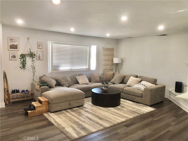 living room featuring dark hardwood / wood-style flooring