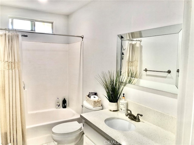 full bathroom with shower / tub combo, vanity, and toilet