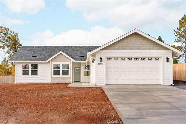 ranch-style house featuring a garage