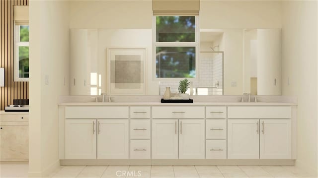 bathroom featuring tile patterned flooring and vanity