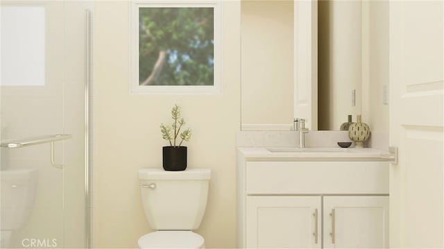 bathroom featuring an enclosed shower, vanity, and toilet