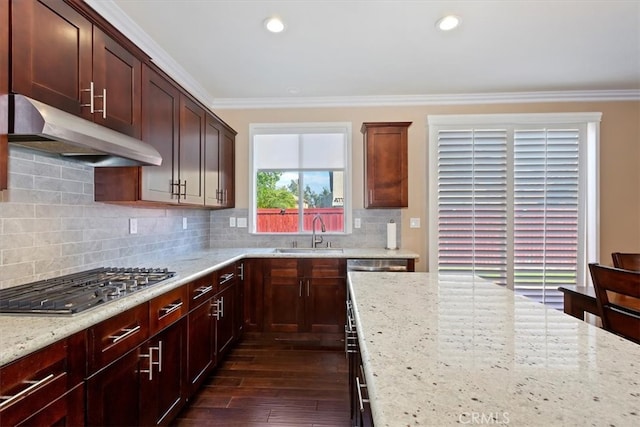 kitchen featuring sink, stainless steel gas cooktop, dark hardwood / wood-style floors, light stone countertops, and crown molding