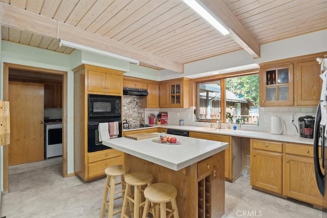 kitchen featuring wood ceiling, black appliances, backsplash, and beamed ceiling