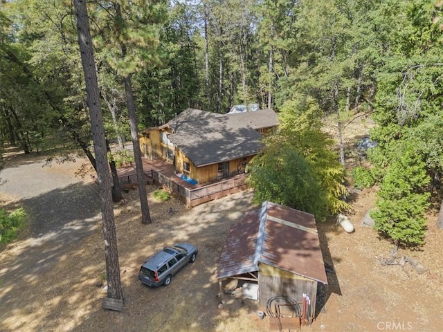 aerial view with a wooded view