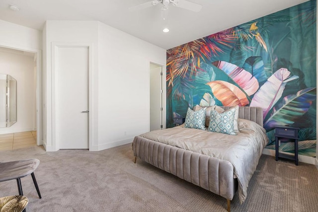 bedroom with ceiling fan and carpet