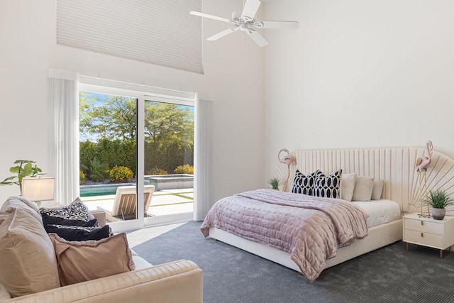 carpeted bedroom featuring ceiling fan and access to outside