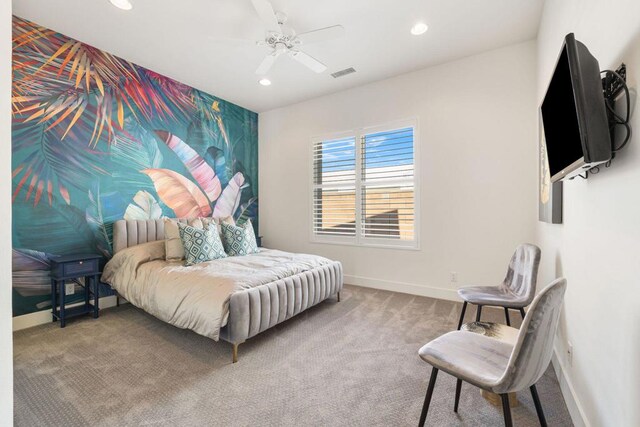 bedroom with ceiling fan and carpet floors