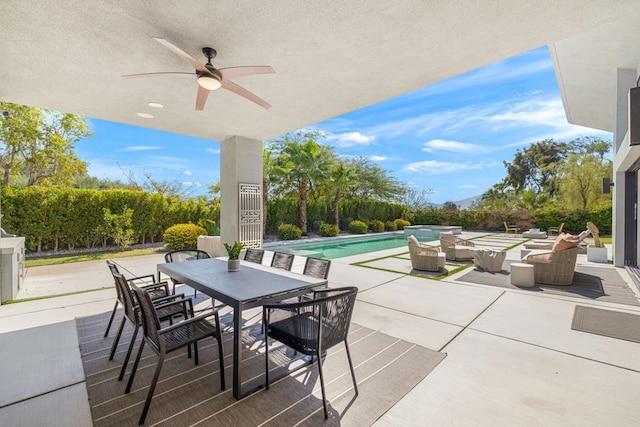 view of patio with ceiling fan