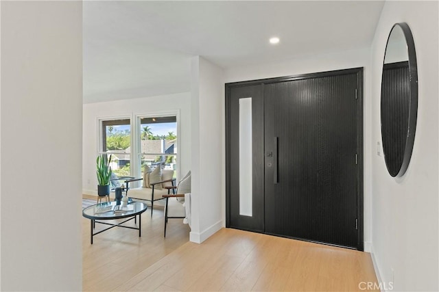 foyer entrance featuring light wood-type flooring