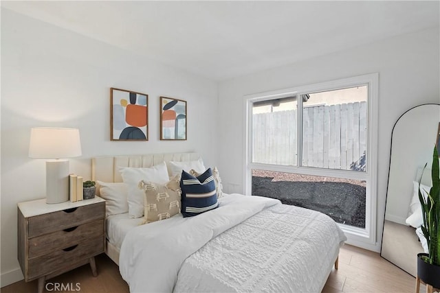 bedroom featuring light hardwood / wood-style flooring