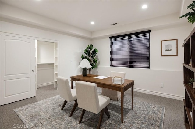 view of carpeted dining space