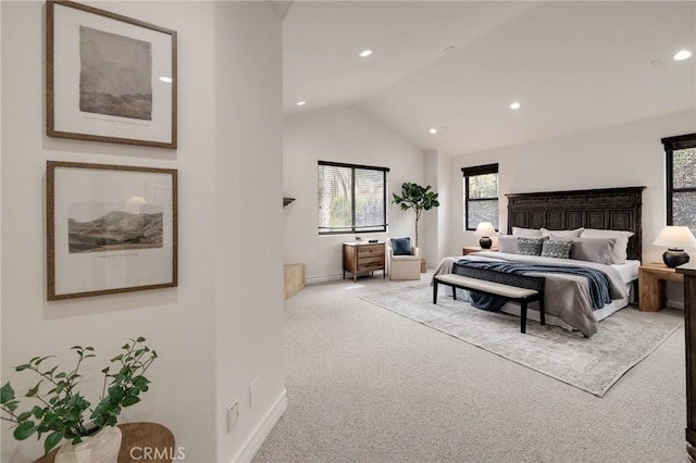 bedroom featuring carpet flooring and vaulted ceiling