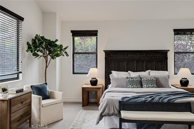 bedroom with light carpet