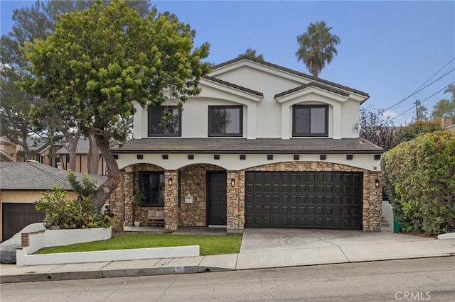 view of front of property featuring a garage