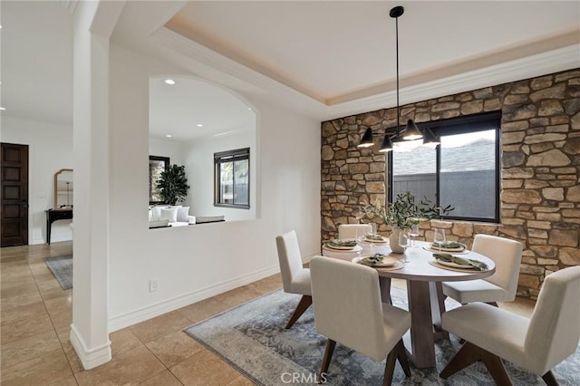 dining space featuring plenty of natural light and light tile patterned flooring