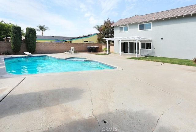 view of swimming pool with a diving board, a patio area, and a pergola