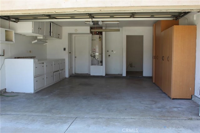 garage with strapped water heater