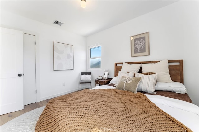 bedroom featuring light hardwood / wood-style floors