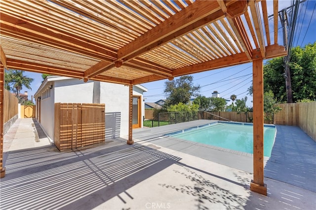 view of swimming pool with a pergola and a patio area