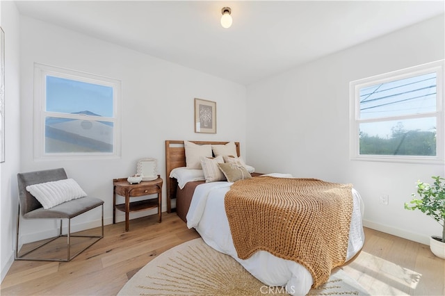 bedroom featuring light wood-type flooring