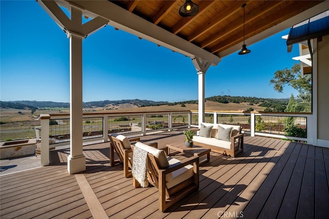 wooden deck with a rural view