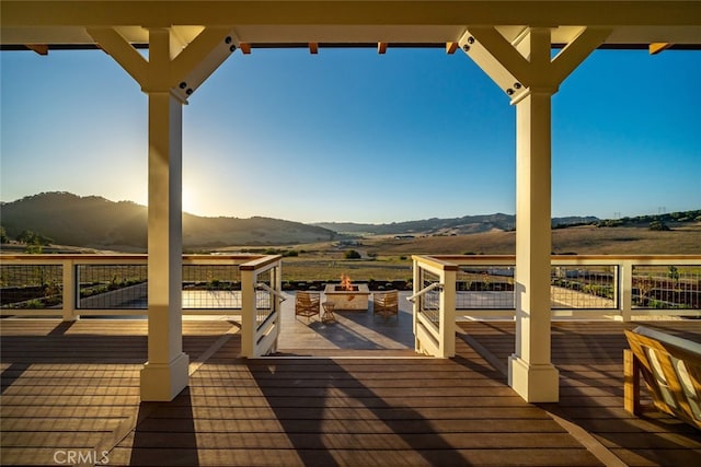 wooden terrace with a mountain view