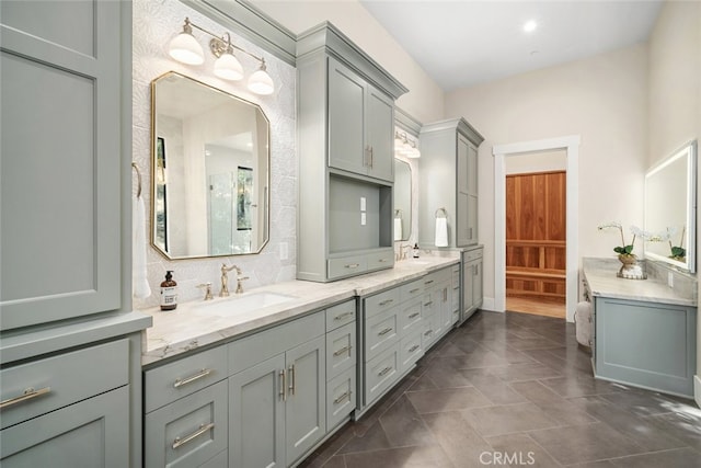 bathroom with decorative backsplash, tile patterned flooring, and vanity