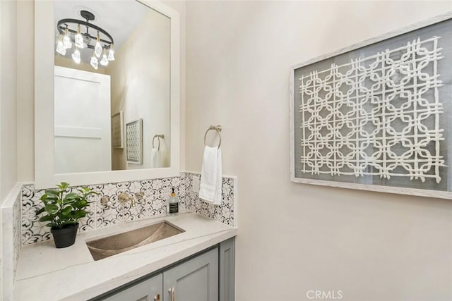 bathroom featuring backsplash and vanity