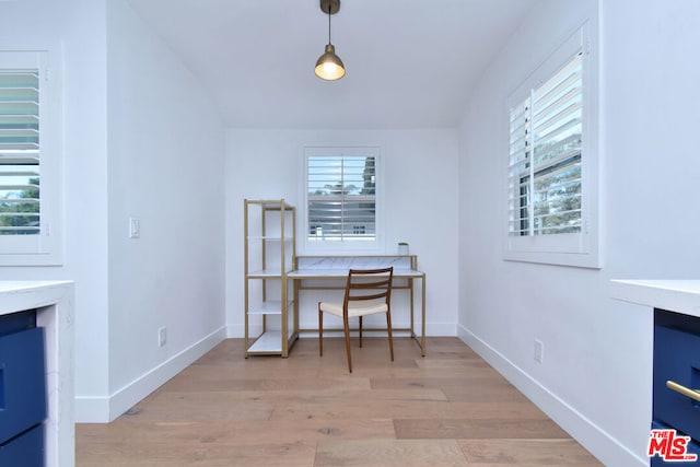 home office featuring light hardwood / wood-style floors