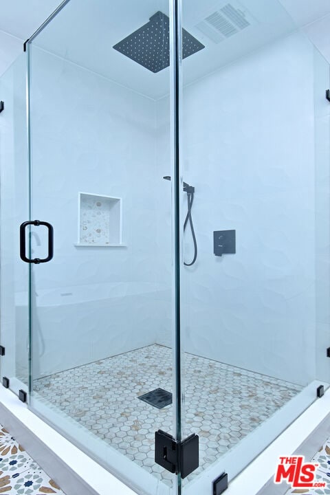 interior details featuring walk in shower