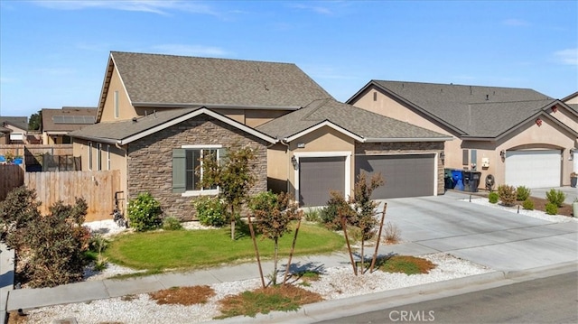 view of front of home with a front lawn and a garage