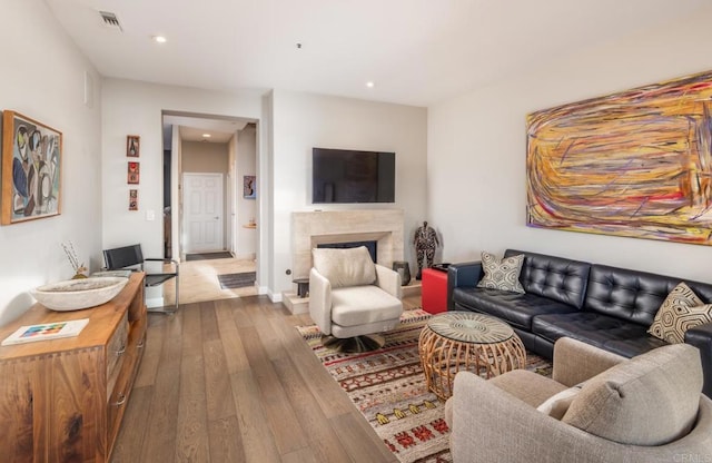 living room with light hardwood / wood-style floors