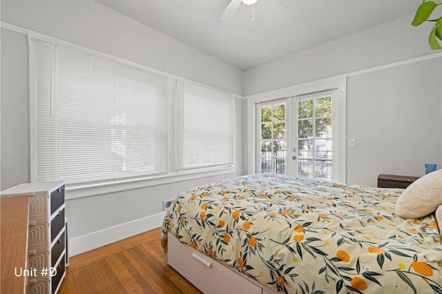 bedroom featuring baseboards, ceiling fan, wood finished floors, access to outside, and french doors