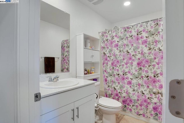 full bathroom featuring vanity, toilet, and shower / bath combination with curtain