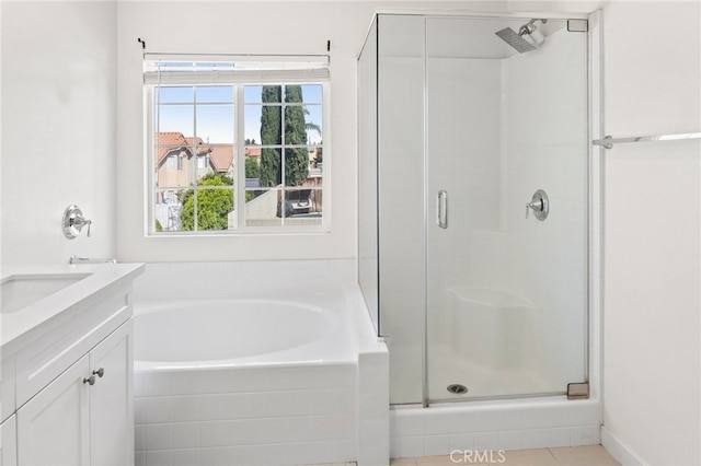 bathroom with vanity and plus walk in shower