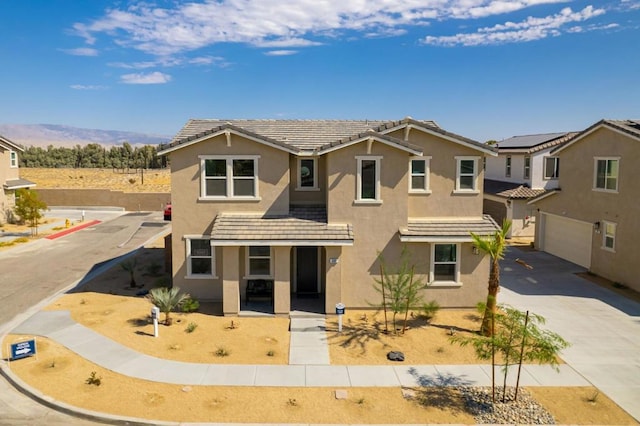 view of front of property with a garage