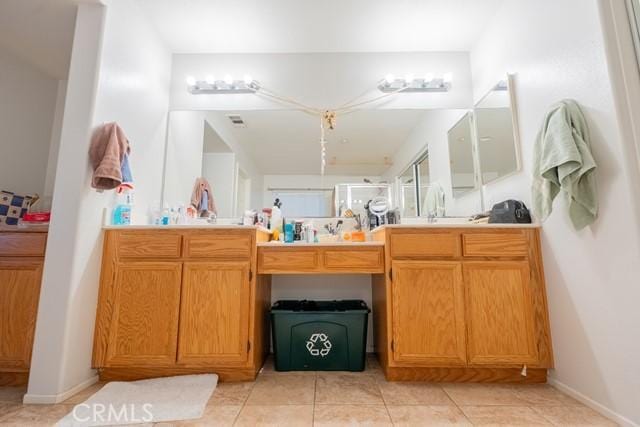 bathroom featuring tile patterned flooring