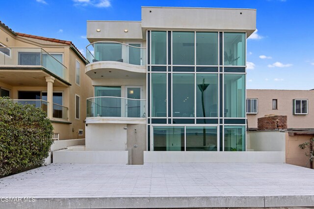 view of front of house featuring a water view