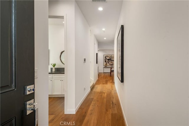 hall featuring light hardwood / wood-style flooring