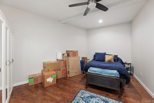 bedroom with ceiling fan and dark hardwood / wood-style flooring