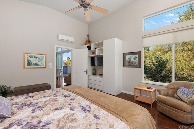 bedroom with ceiling fan, a wall mounted AC, and dark hardwood / wood-style floors