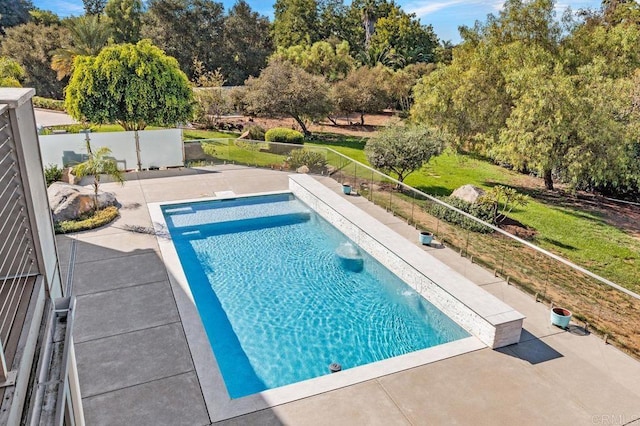 view of swimming pool featuring a patio