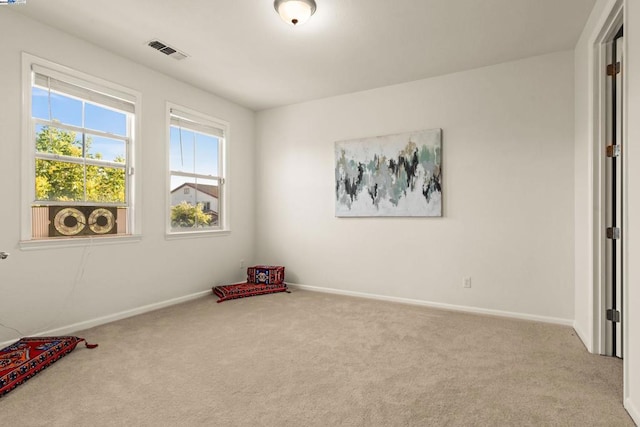 interior space featuring light colored carpet