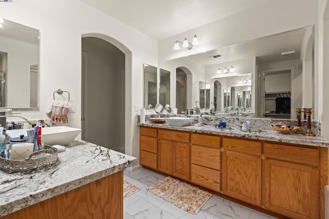 bathroom featuring vanity and a bathtub