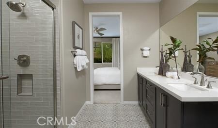 bathroom with vanity and an enclosed shower