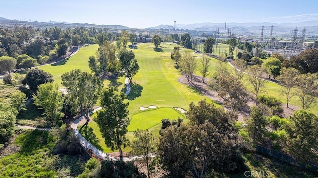 birds eye view of property with a mountain view