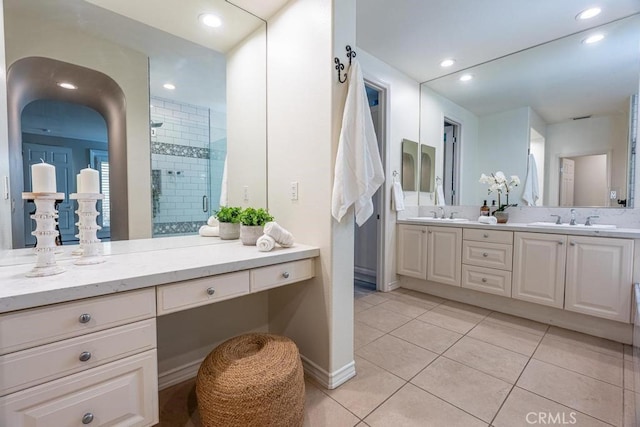 bathroom with vanity, tile patterned floors, and an enclosed shower