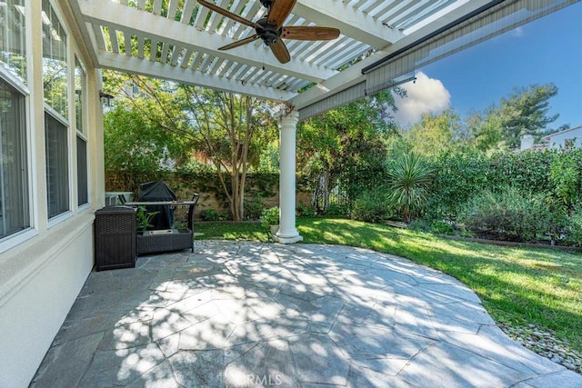 view of patio with ceiling fan and a pergola