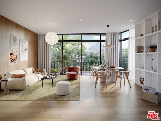 interior space featuring a wall of windows, wood-type flooring, wood walls, and built in features