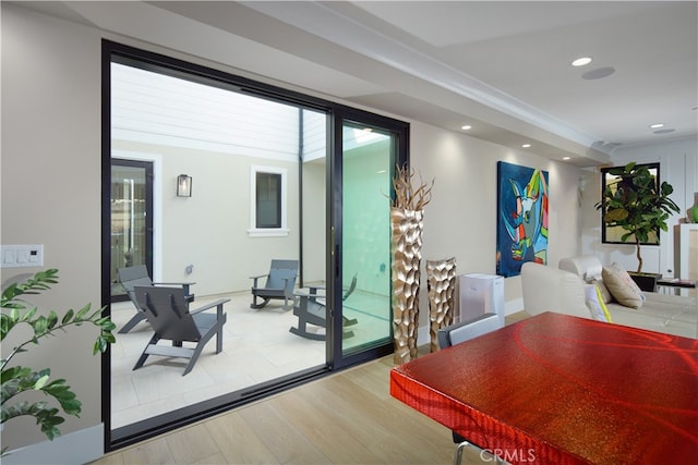 dining space with light wood-type flooring